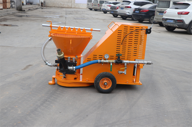 Shotcrete machine for spraying concrete